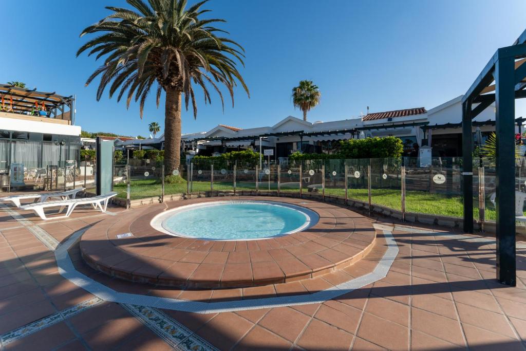 The swimming pool at or close to Luxury Poolside Holiday Home