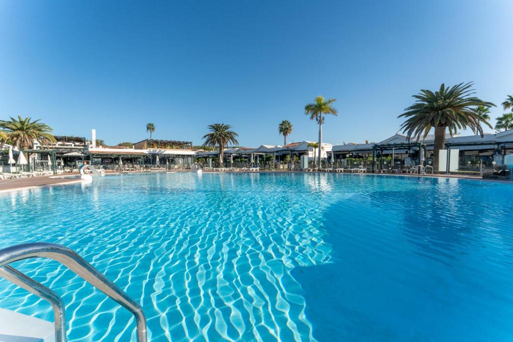 The swimming pool at or close to Luxury Poolside Holiday Home