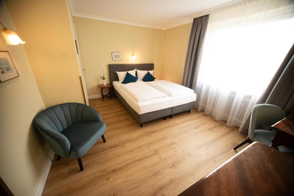 Postel nebo postele na pokoji v ubytování Hotel Altmünchen by Blattl