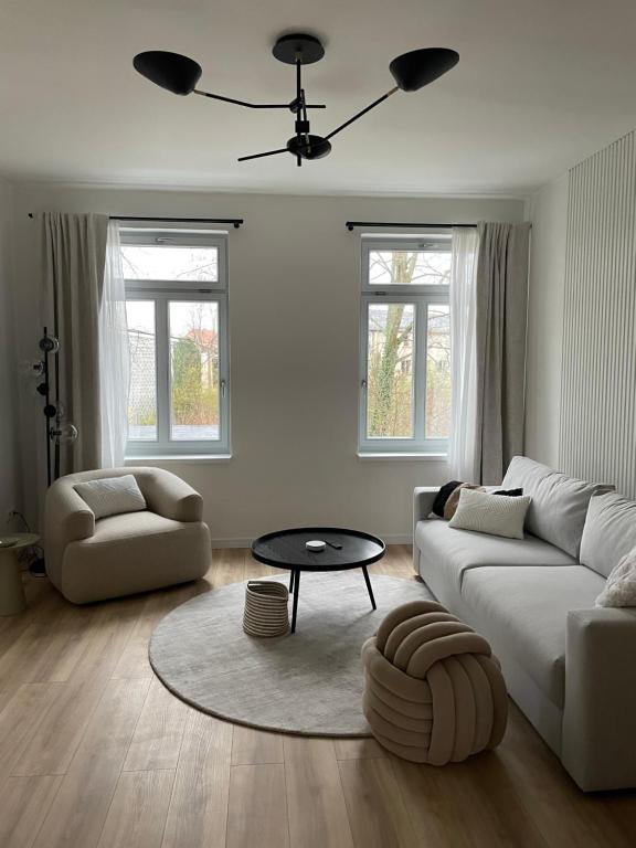 Posezení v ubytování ApartNaest - vollausgestattete Apartments I kostenlos parken I flexibler Check-in I 1 bis 4 Zimmer I 1 bis 10 Personen