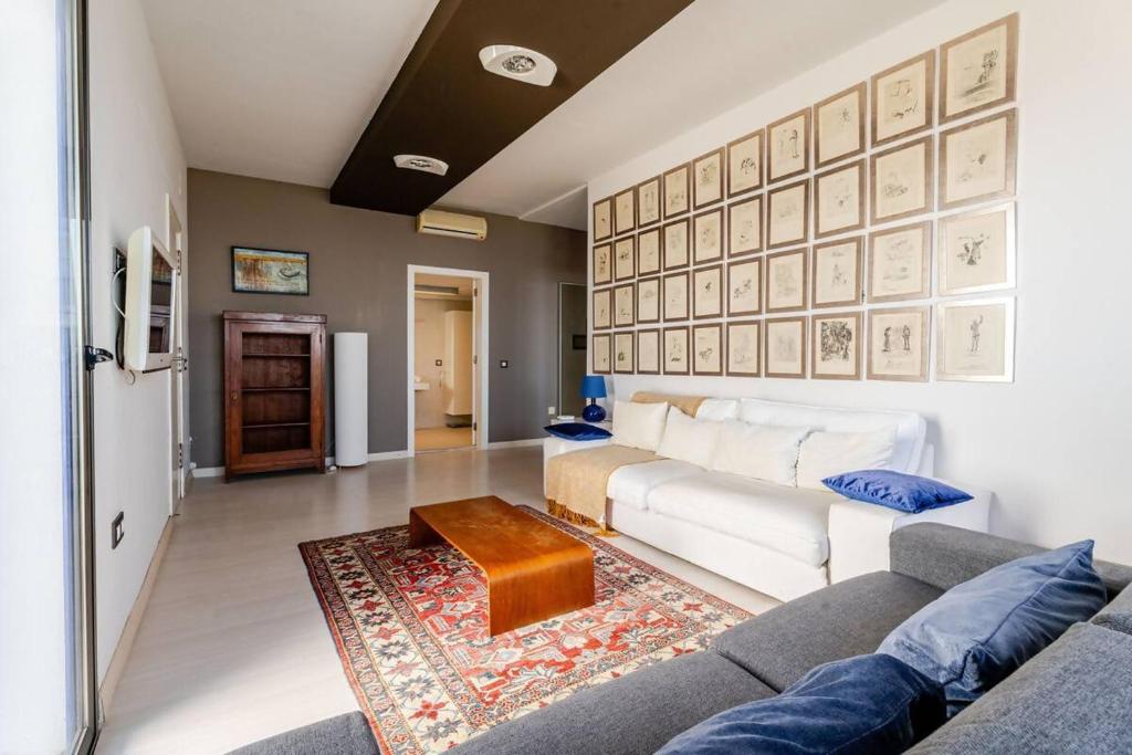 Posezení v ubytování Villa Itaca Vista mar y piscina climatizada