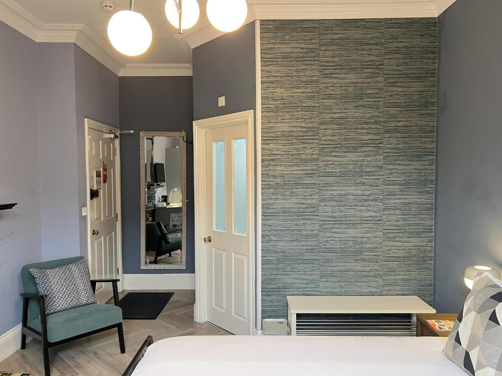Postel nebo postele na pokoji v ubytování Melbury Rooms & Studios