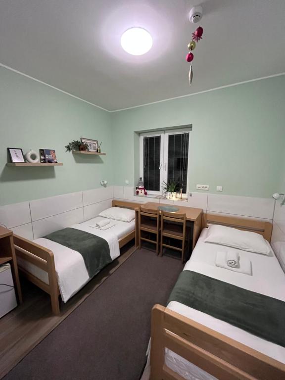 Postel nebo postele na pokoji v ubytování Flow House