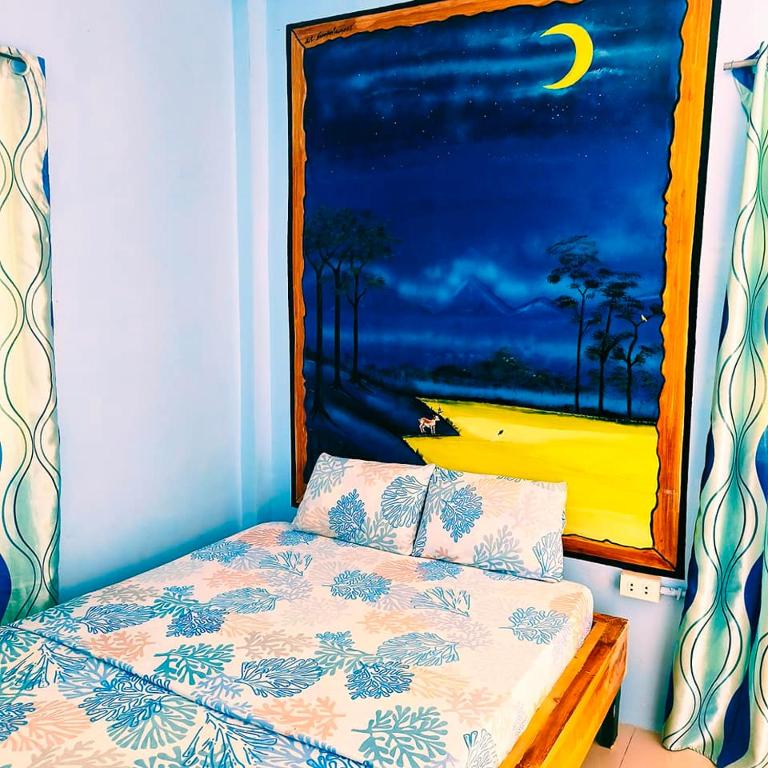 Postel nebo postele na pokoji v ubytování Chef Panyang Beach Resort Okoy