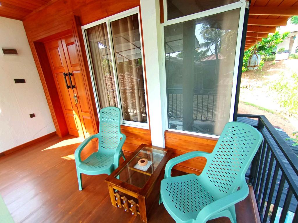 Posezení v ubytování Thusara Guesthouse