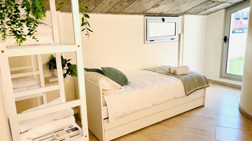 Postel nebo postele na pokoji v ubytování Dúplex ático familiar by Prestigi