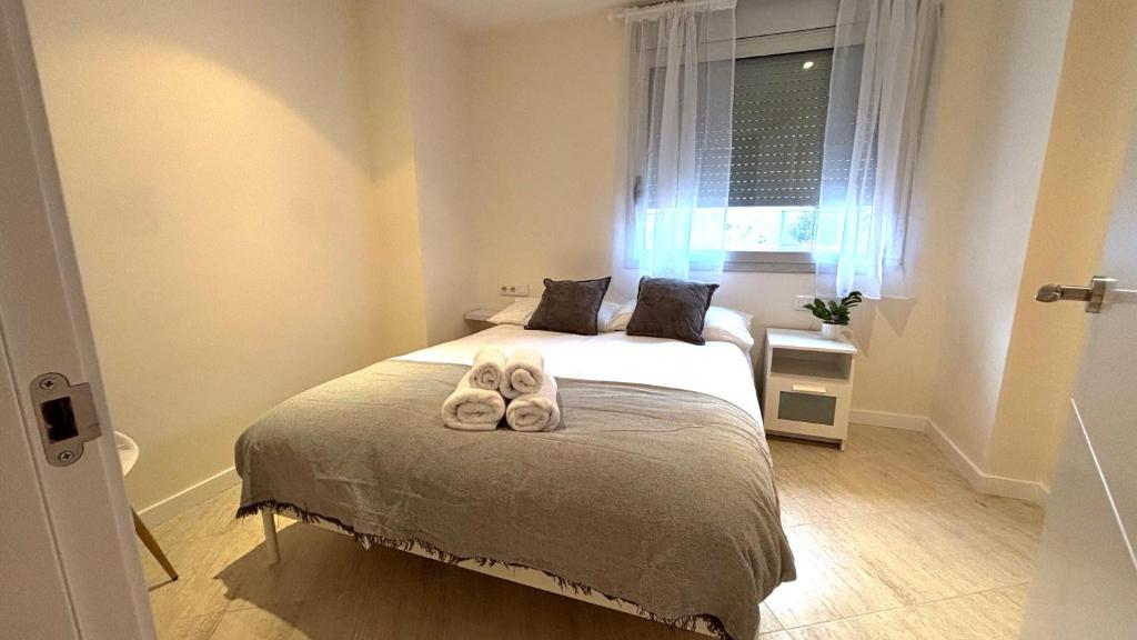 Postel nebo postele na pokoji v ubytování Dúplex ático familiar by Prestigi