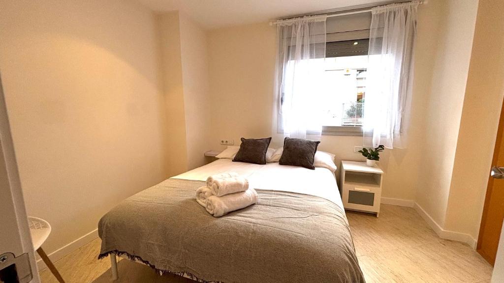 Postel nebo postele na pokoji v ubytování Dúplex ático familiar by Prestigi
