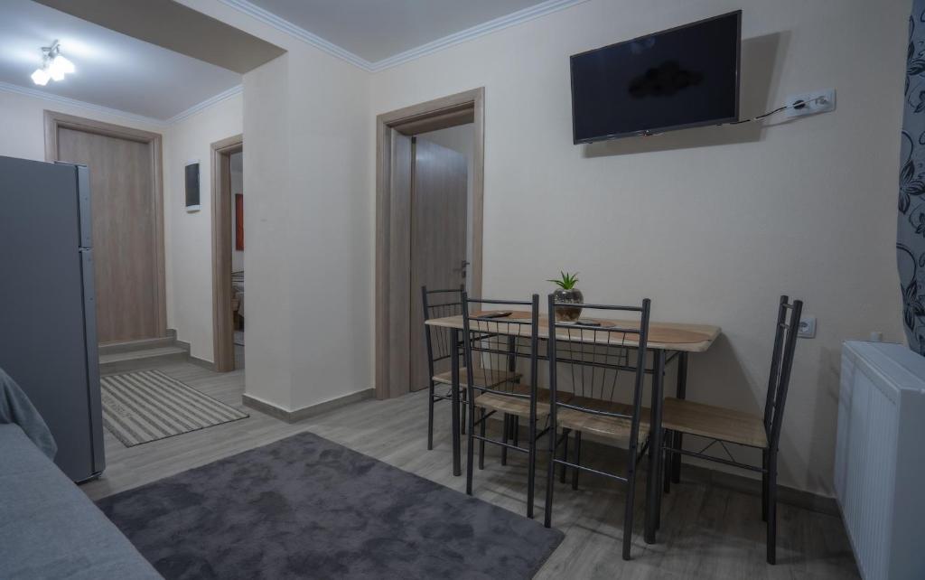 Televízia a/alebo spoločenská miestnosť v ubytovaní Xrysa's House