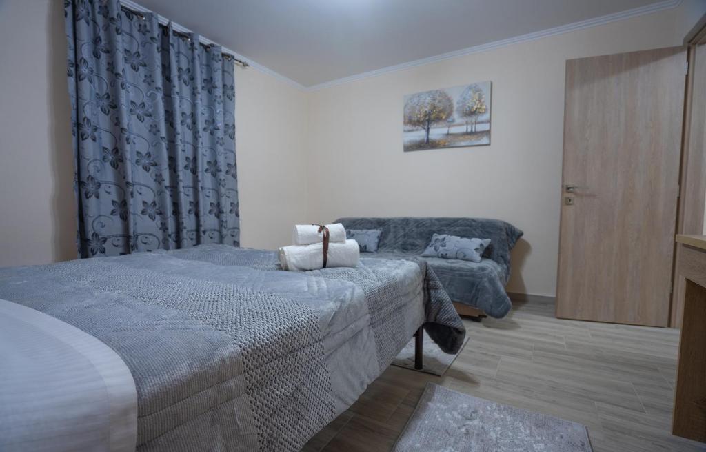 Posteľ alebo postele v izbe v ubytovaní Xrysa's House
