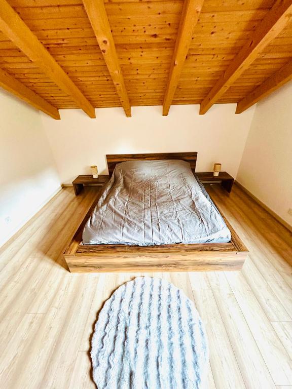 Postel nebo postele na pokoji v ubytování Appartement duplex spacieux