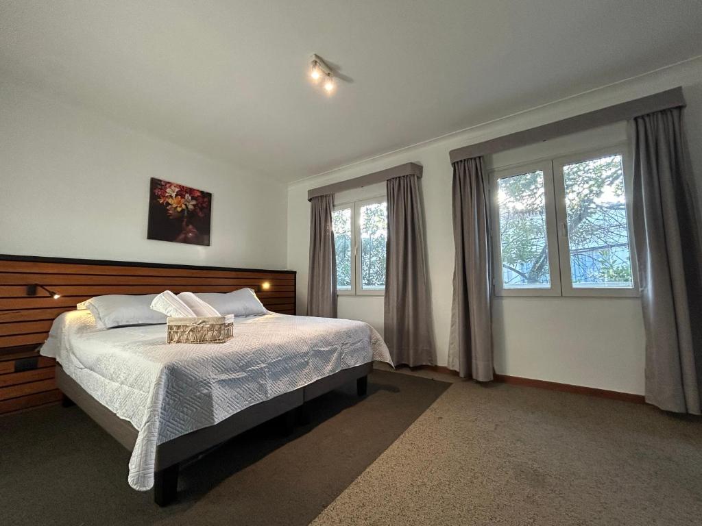 Postel nebo postele na pokoji v ubytování Casona Italia B & B