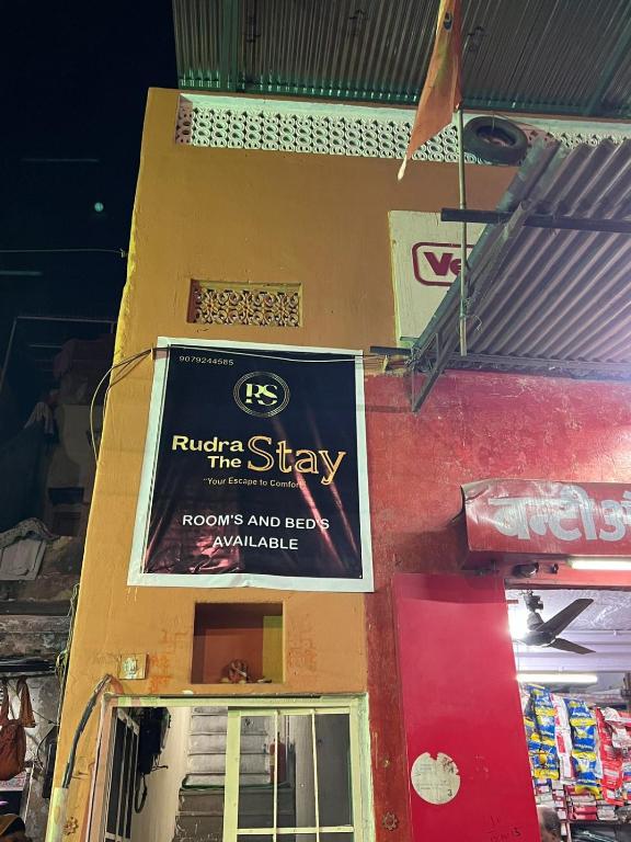 a sign on the side of a building at Rudra The Stay in Jaipur