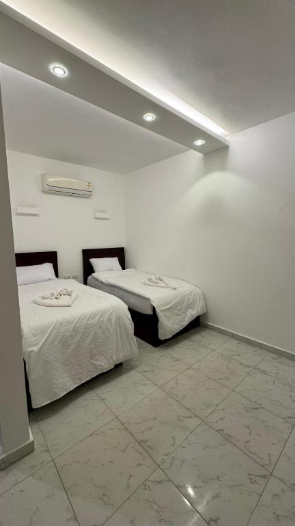 Postel nebo postele na pokoji v ubytování Desert Hotel Dahab