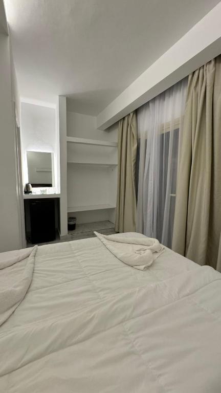 Postel nebo postele na pokoji v ubytování Desert Hotel Dahab