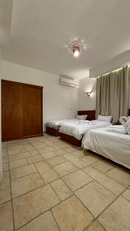 Postel nebo postele na pokoji v ubytování Desert Hotel Dahab