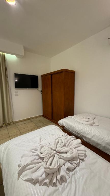 Postel nebo postele na pokoji v ubytování Desert Hotel Dahab