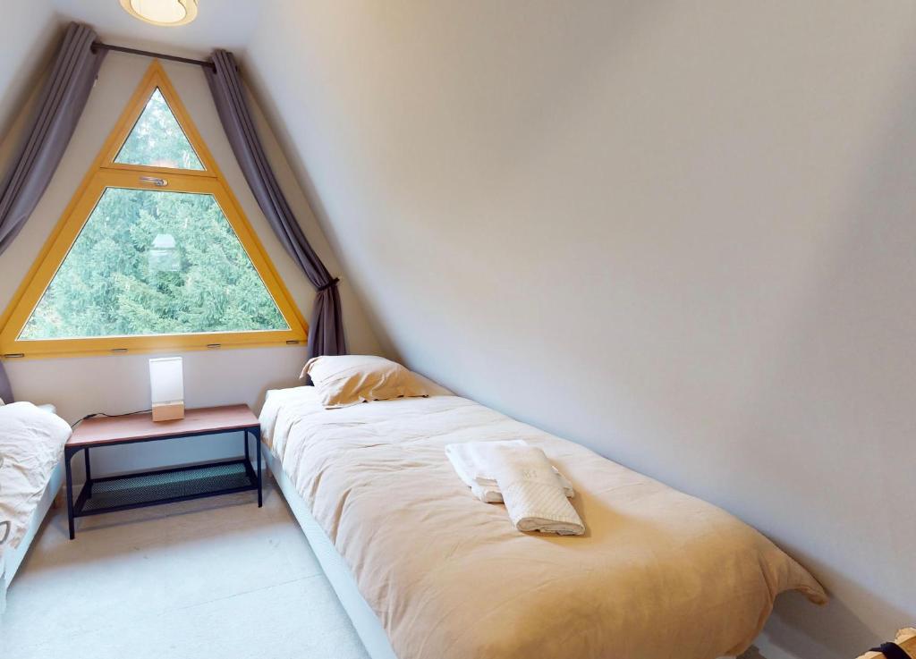 Letto o letti in una camera di Chalet l'Escale