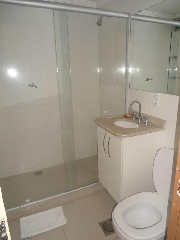 Um banheiro em Flat Garvey Apart-hotel