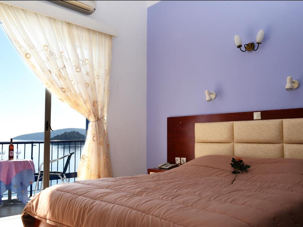 Postel nebo postele na pokoji v ubytování Hotel Solon
