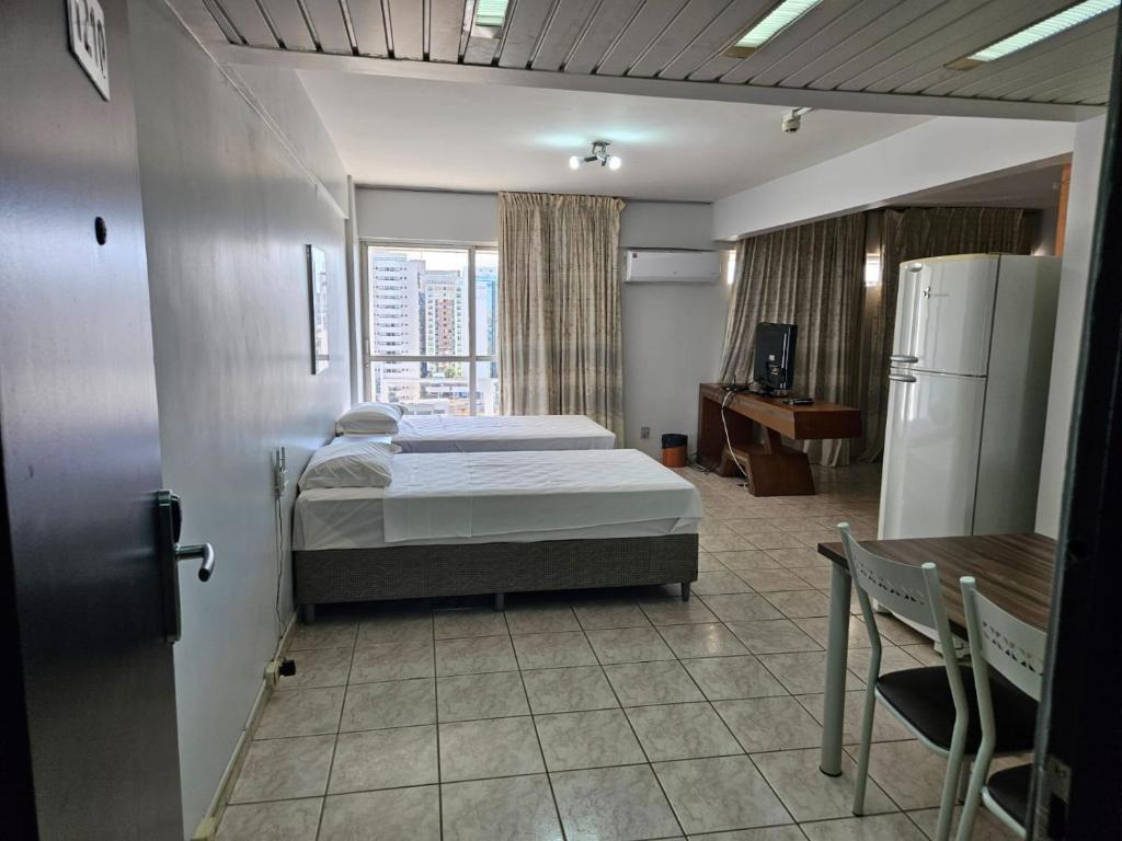Cama ou camas em um quarto em Flat Garvey Apart-hotel