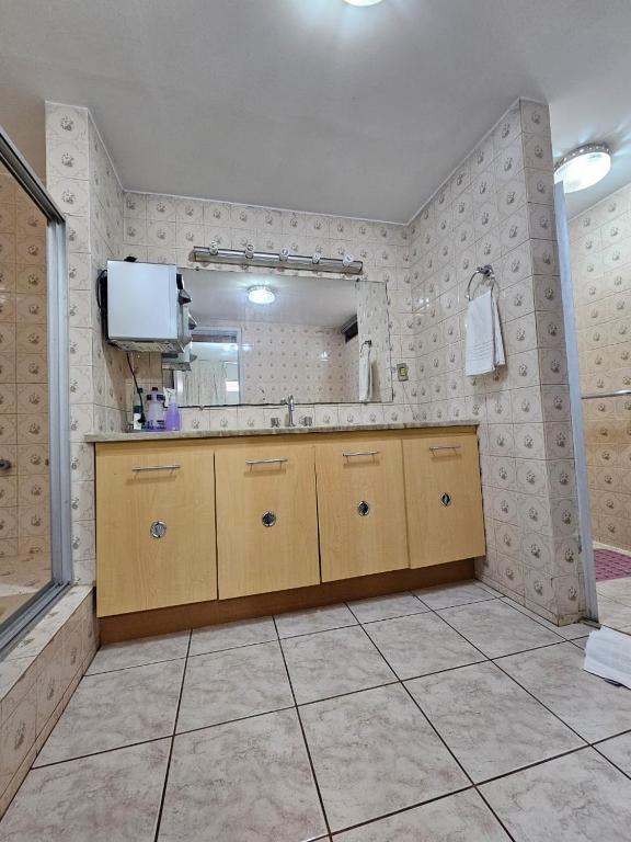 Um banheiro em Flat Garvey Apart-hotel