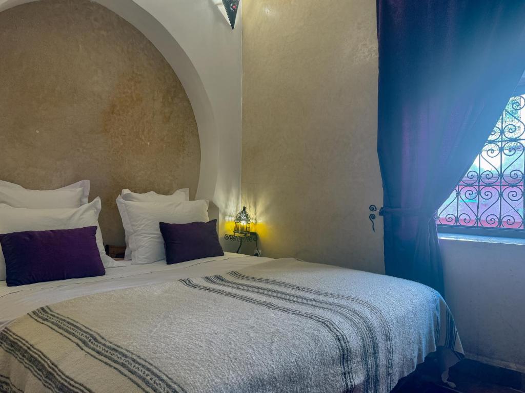 Postel nebo postele na pokoji v ubytování Riad Lapis-lazuli