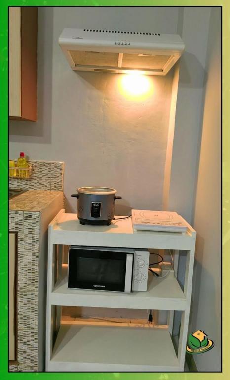 Kuchyň nebo kuchyňský kout v ubytování Central Comfort 2BR Furnished Stay in PPC - Richkizz