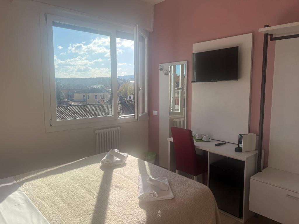 TV a/nebo společenská místnost v ubytování Corte Sant'Orsola 108