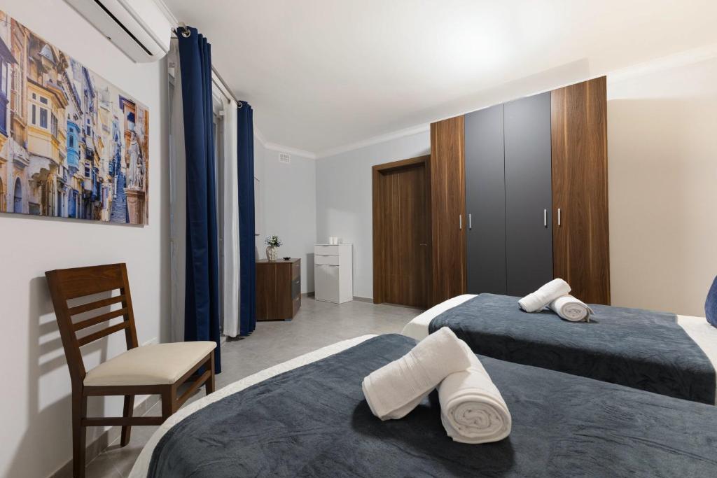 Postel nebo postele na pokoji v ubytování Luxurious & Spacious 2BD Accomodation at The Podium - Yacht Marina Area, Close to Valletta