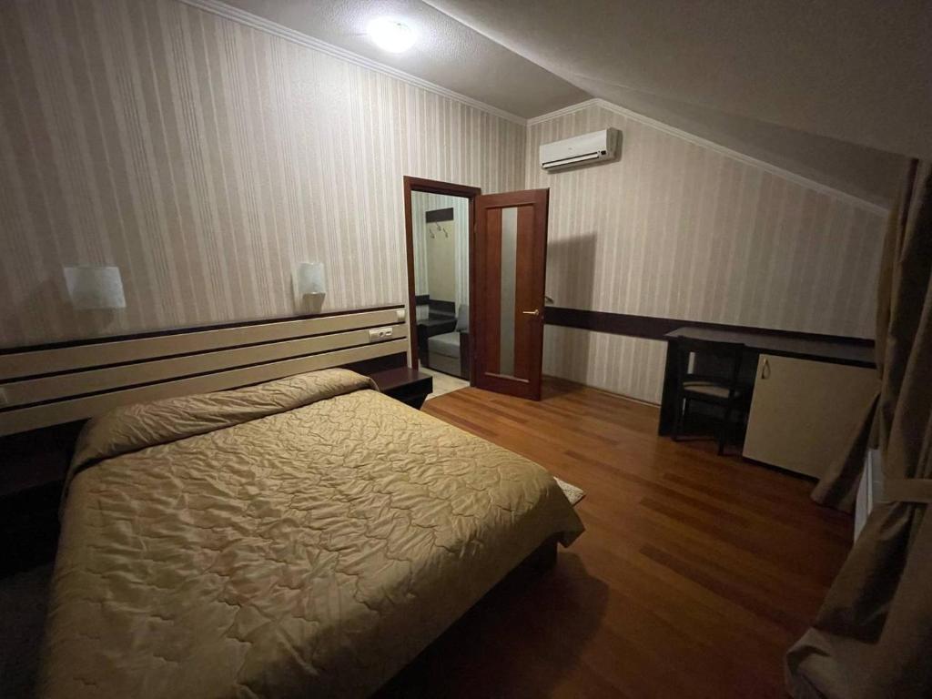 Postel nebo postele na pokoji v ubytování Mini-Hotel in Kharkiv
