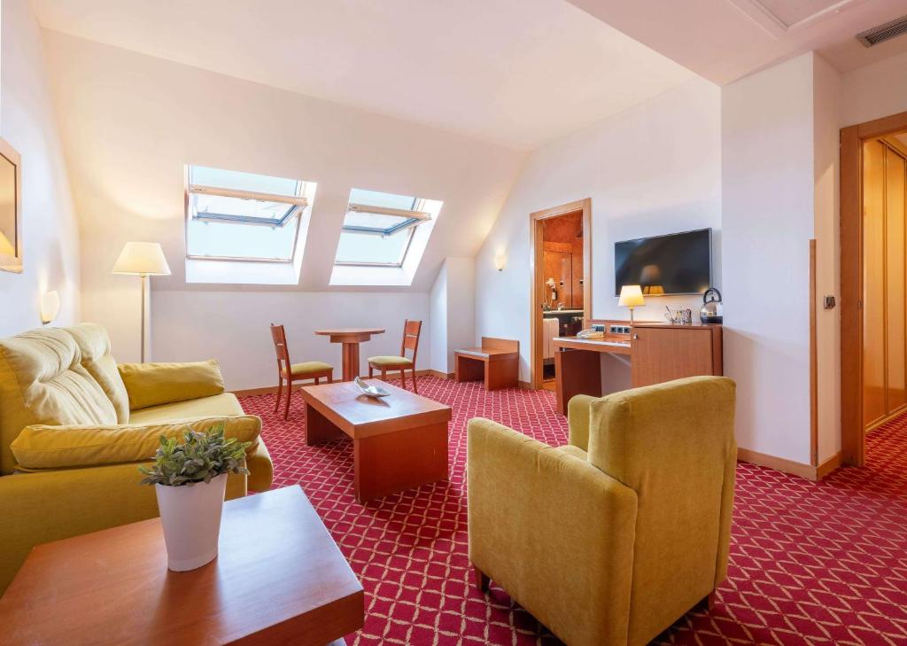 TV a/nebo společenská místnost v ubytování Hotel Zentral León