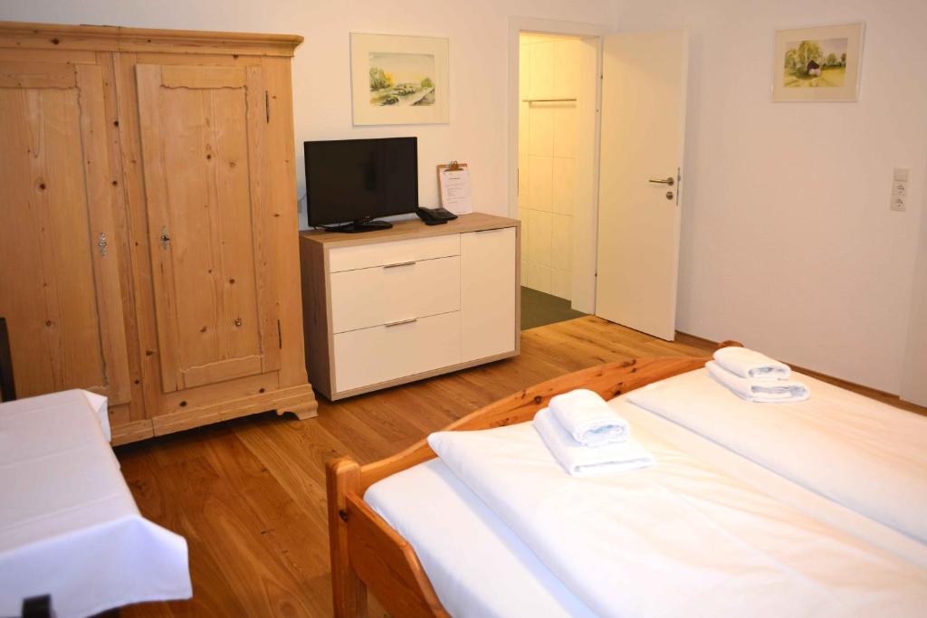 Postel nebo postele na pokoji v ubytování Hotel Andreas Hofer
