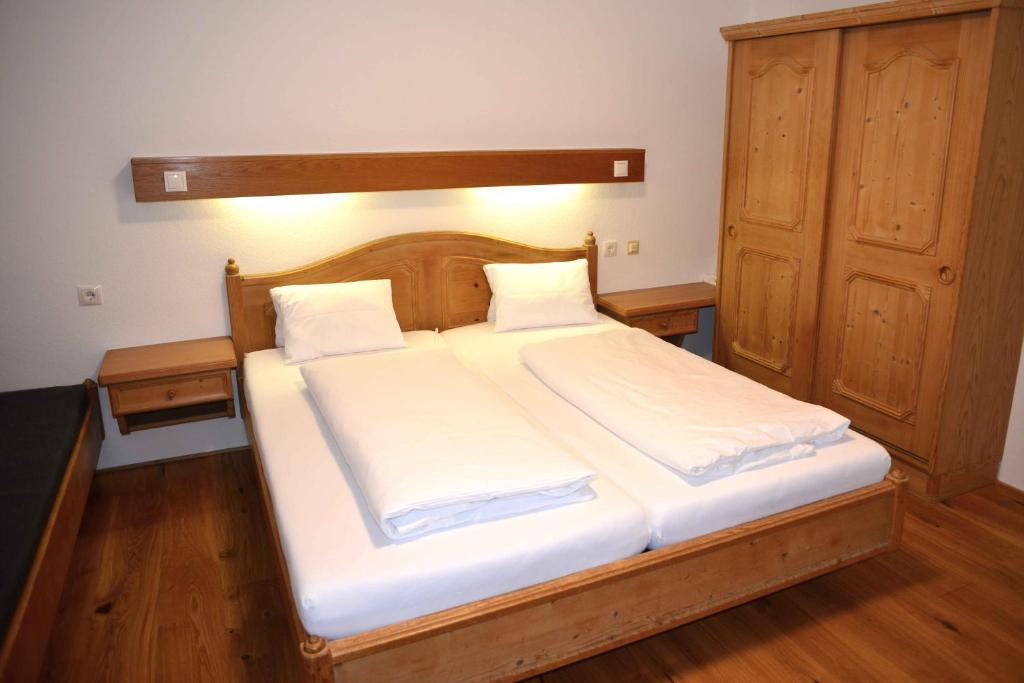 Postel nebo postele na pokoji v ubytování Hotel Andreas Hofer