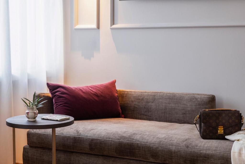 Posezení v ubytování Adoro Hotel