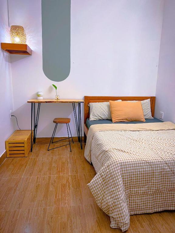 Postel nebo postele na pokoji v ubytování Nguyên căn 3 phòng ngủ - July Homestay Phú Yên