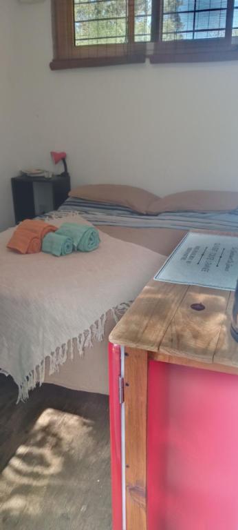 Postel nebo postele na pokoji v ubytování Aguaymanto
