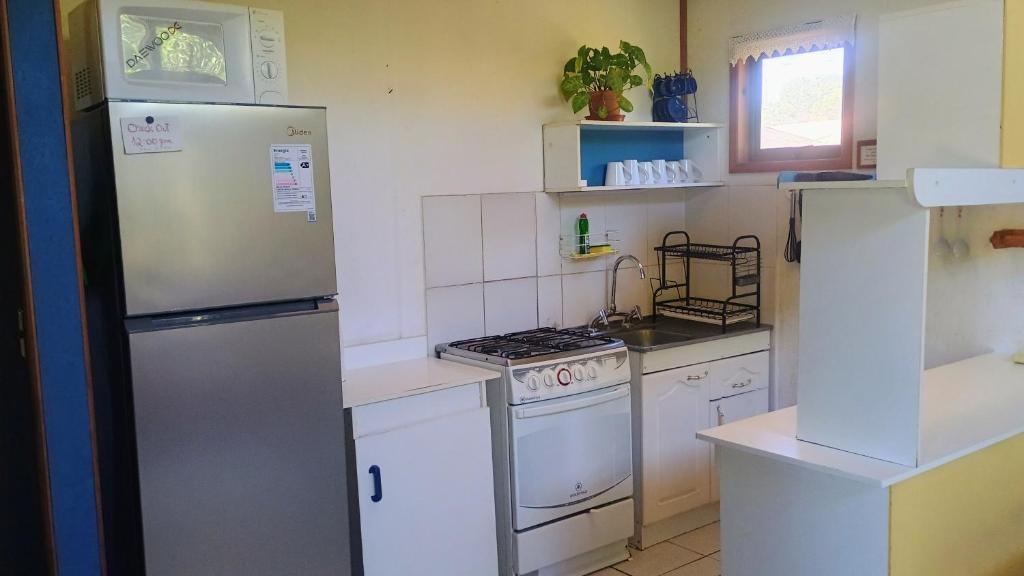 Kuchyň nebo kuchyňský kout v ubytování Cabaña Los Laureles