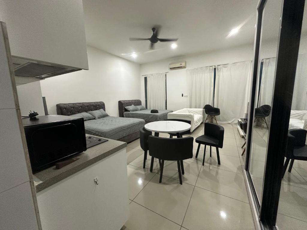 Ένα ή περισσότερα κρεβάτια σε δωμάτιο στο D Studio16 Cyberjaya - Free Wi-Fi