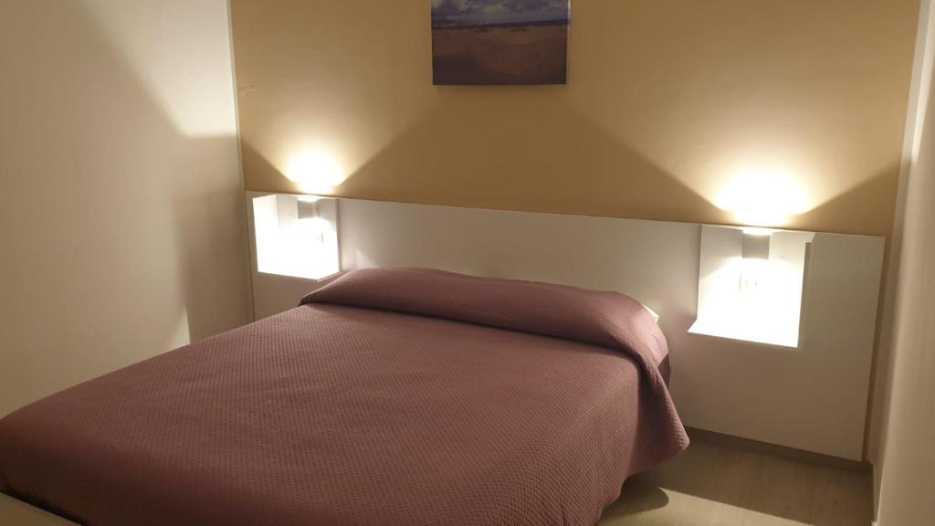 Postel nebo postele na pokoji v ubytování B&B San Lorenzo