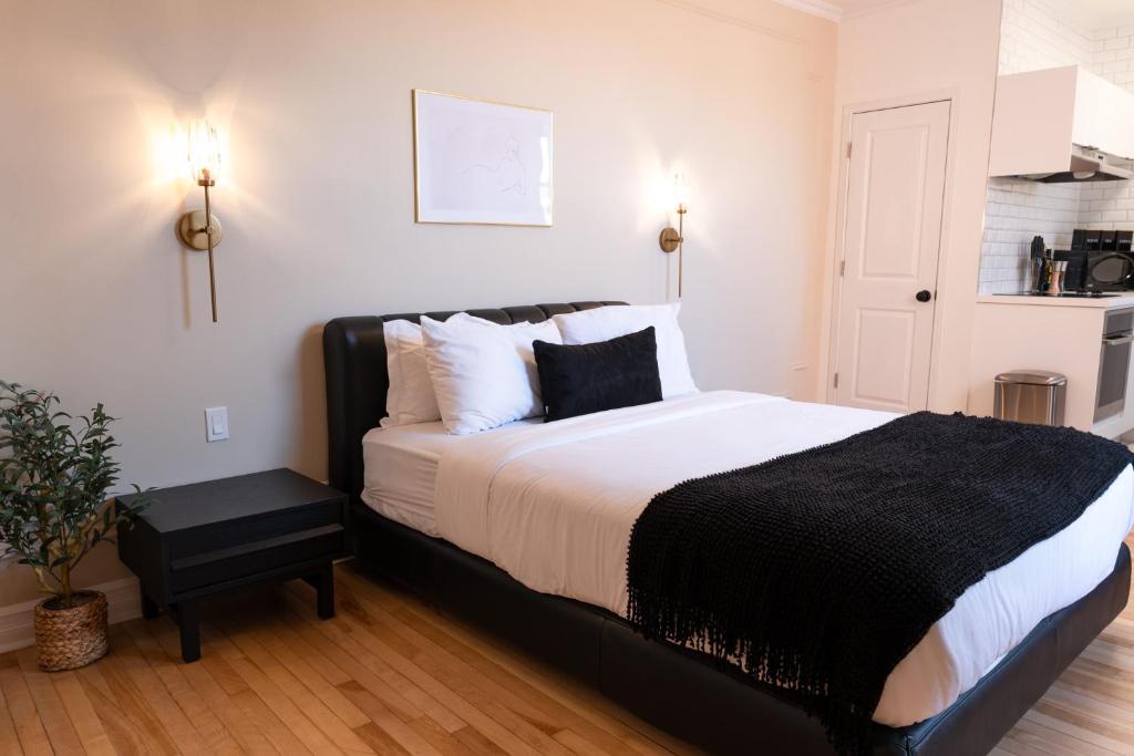 Postel nebo postele na pokoji v ubytování #9 - Classic Studio - Self Check in - Plateau - St-Denis - AC - TV