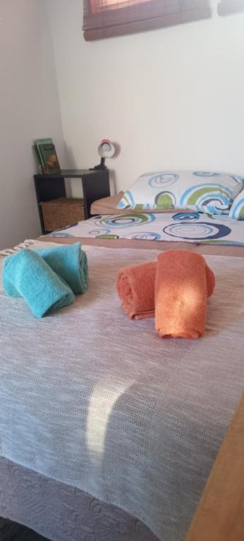 Postel nebo postele na pokoji v ubytování Aguaymanto