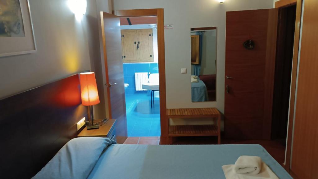 Postel nebo postele na pokoji v ubytování Dulce Posada