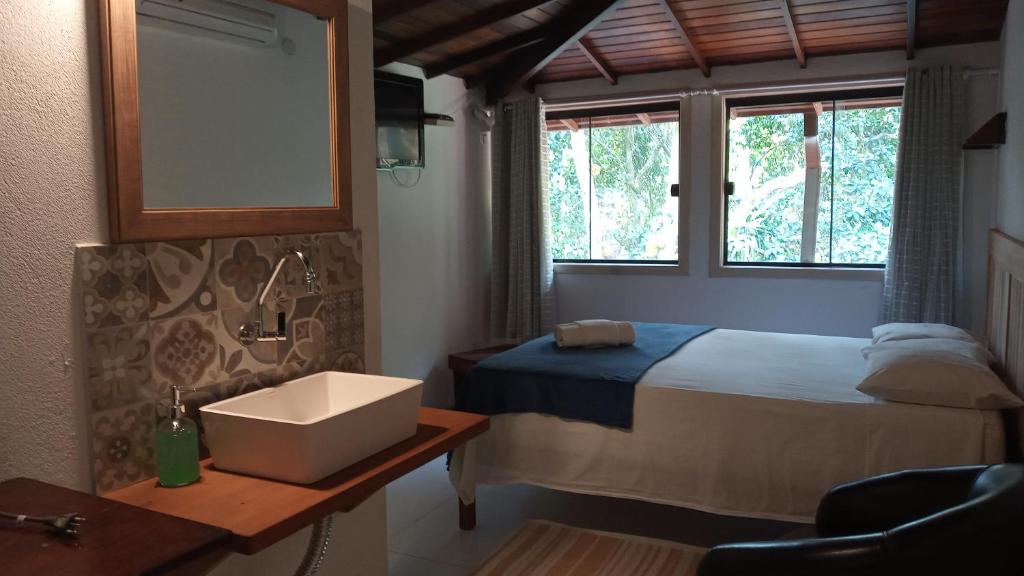 Postel nebo postele na pokoji v ubytování Pitanga Ilha Grande