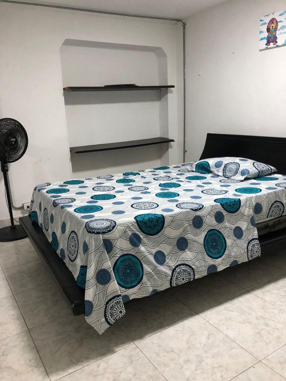 Postel nebo postele na pokoji v ubytování Hostal Casa Yare