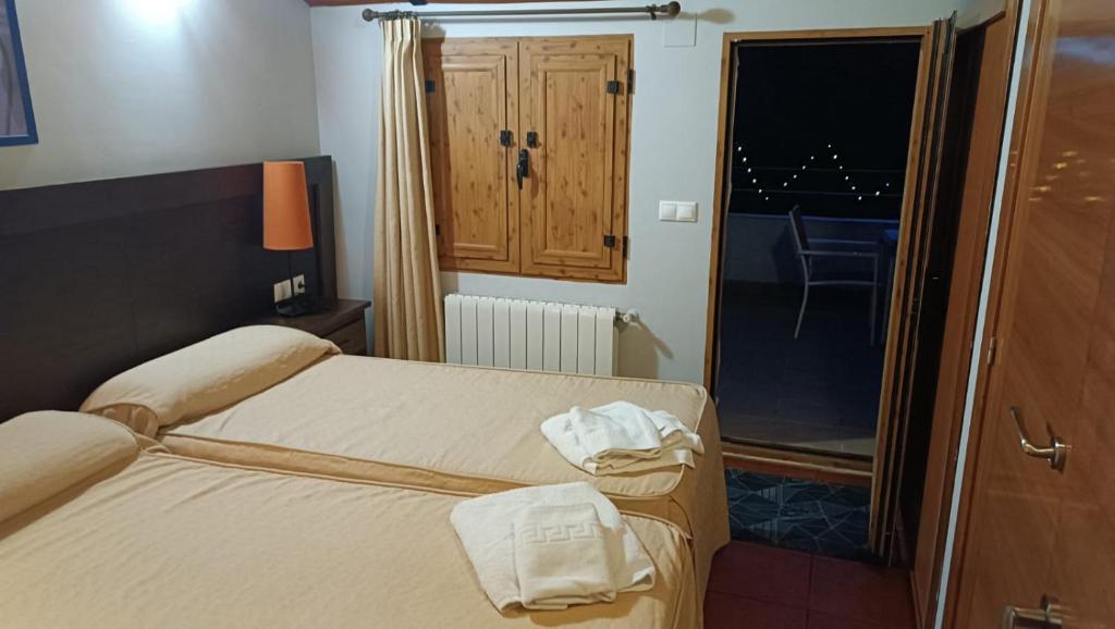 Postel nebo postele na pokoji v ubytování Dulce Posada