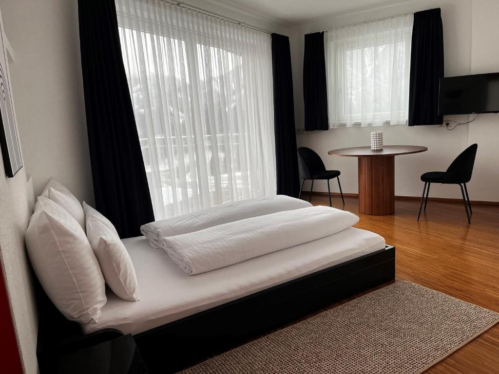 Posteľ alebo postele v izbe v ubytovaní Appartements Maria Theresia