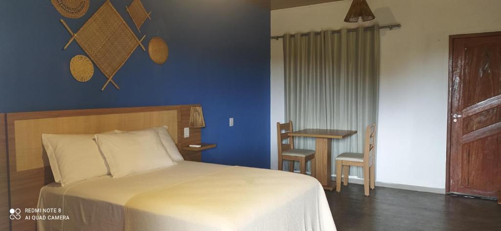 Postel nebo postele na pokoji v ubytování Pousada Lençóis Eco Villa