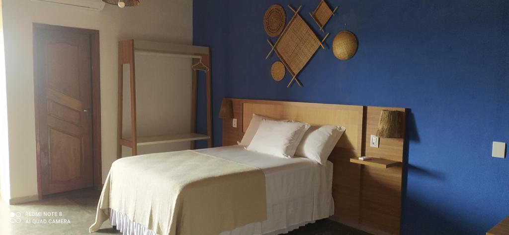 Postel nebo postele na pokoji v ubytování Pousada Lençóis Eco Villa