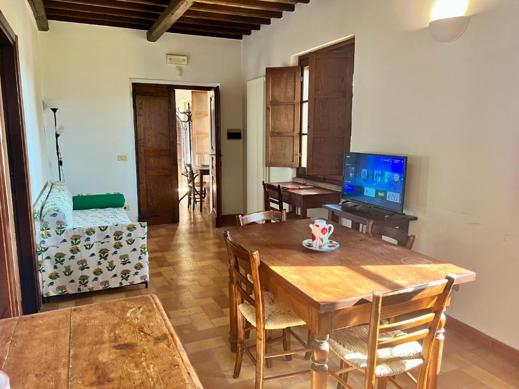 TV a/nebo společenská místnost v ubytování Agriturismo Podere La Fornace